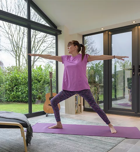 A lady exercising in an extension